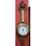 A Victorian oak barometer mercury thermometer, carved with leafy scrolls, 88cm high, c.