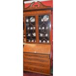 A Sheraton Revival mahogany and marquetry bureau bookcase,