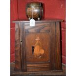 An oak smokers cabinet,