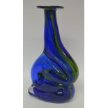 An art glass vase, irregular, in blue,