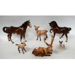 A Beswick study, of a chestnut mare, standing; another, stallion, hoof raised; a Beswick stag,