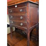 A 20th century mahogany music/filing cabinet, three quarter gallery above three long drawers,