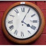 An early 20th century oak school room clock/railway clock approx 38cm diameter