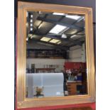 A large Neo Classical style rectangular wall mirror,