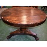 A 19th century rosewood centre table, circular top above a deep frieze,
