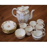 A Royal Crown Derby part coffee service, painted with gilt and floral swags, comprising coffee pot,