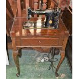 A vintage 1950s singer sewing machine, 1951 model,