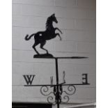 Salvage & Reclamation - a weathervane, the ornament as a rearing horse, bold directionals, 147.