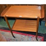 A retro mid-20th century teak buffet/serving trolley