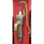 A 20th century brass manual lift stirrup water pump, shaped lever,
