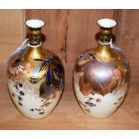 A pair of Royal Crown Derby bottle vases, numbered 2553 758,