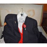 A canvas covered military issue suitcase containing dress uniform,