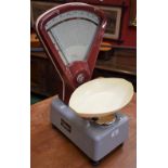 A set of Vandome & Hart retailer's scales,