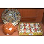 A Chinese carved wood box as a pomegranate; a Cloisonné decorative plate,