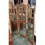 A French design 'giltwood' three fold screen, each panel mirrored with foliate gadrooned borders,