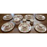 A Royal Worcester Royal Garden pattern tea service, for six, pink and white roses on white ground,