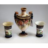 A Hadleys Worcester pedestal ovoid vase, decorated with roses, lion masks flying handles,