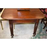 A William IV design mahogany extending dining table, moulded rounded rectangular top,