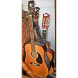 Two 'Encore' six string acoustic guitars, model No. W250, and model No.