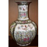 A large Chinese Famille Rose flared bottle vase, decorated throughout with birds,