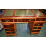 A yew twin pedestal writing desk,