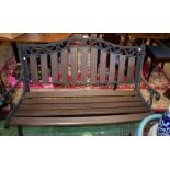 A Victorian style cast end garden bench