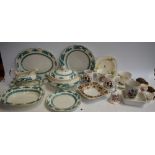 A Booth's green Dragon pattern dinner service, including plates, lidded tureens,