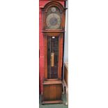 A 20th century oak cased longcase clock, arched dial inscribed Tempus Fugit,