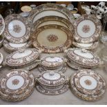 A 19th century Staffordshire dinner service, comprising lidded vegetable dishes,
