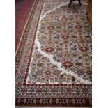 An Axminster Brixham carpet/rug, woven throughout with stylised flowers,