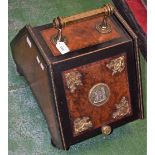 A 19th century walnut and eboniesd purdonium/coal box, the hinged cover set with Sevres plaque, c.
