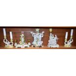 A pair of Continental ceramic table lamps, in the form of ornate candelabra, floral decoration,