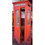 Salvage & Reclamation - a telephone box/booth, painted in the traditional British manner,