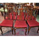 A set of eight Chippendale style mahogany dining chairs