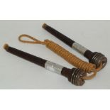 A child's skipping rope, wooden handles ***PLEASE NOTE THERE IS NO BUYER'S PREMIUM ON THIS LOT,
