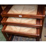 A retro mid-20th century design mahogany tile top nest of three tables,