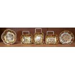 A set of three Royal Crown Derby 1128 solid gold band pattern shaped rectangular trinket dishes,
