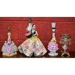 A mid 20th Century ceramic table lamp, as a group of young ladies in crinoline dresses,