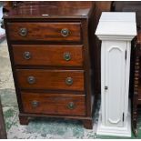 A 20th century mahogany chest of four long drawers;