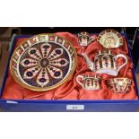 A Royal Crown Derby 1128 pattern miniature tea service, comprising tray, teapot, milk jug,