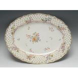 A Chelsea Derby shaped oval serving plate, the field with flower sprays and sprigs,