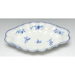 A Caughley Bright Sprigs pattern scalloped oval dish, painted with flowers sprigs, 26.
