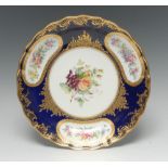 A Copeland lobed circular dish, painted with fruit and nuts,