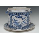 A late 19th/early 20th century Dutch Delft jardiniere and stand,