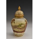 An English Porcelain vase, decorated with a continuous landscape with country house,