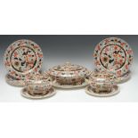 A 19th century Ashworths Ironstone part service, comprising six dinner plates, two tureens,