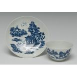 A Worcester The Man in the Pavilion pattern tea bowl and saucer, printed with pagoda, pine trees,