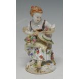 A 19th century Meissen figure, of a flower girl,