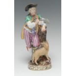 A Meissen figure group of a shepherd and lamb, after an original by Acier,