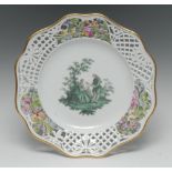 A Meissen shaped circular cabinet plate, the field painted in green,